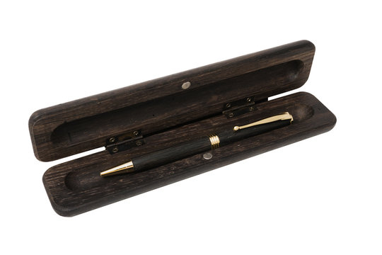 A pencil case for a ballpoint pen made from old oak on a white background