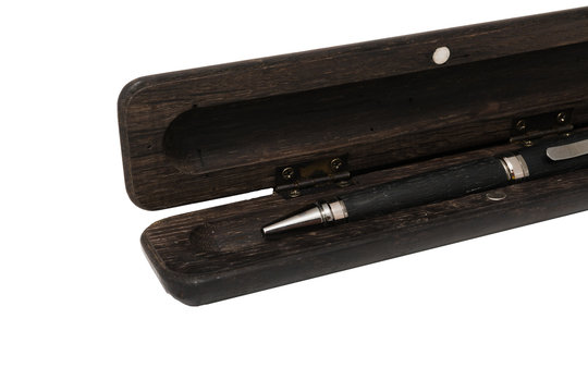 A pencil case for a ballpoint pen made from old oak on a white background