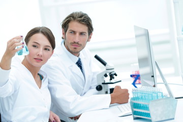 Team of Biologists Researchers Working in Laboratory