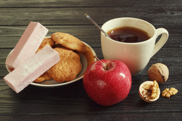 Sweet desserts with cup of tea