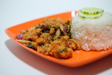 Fried chicken in spicy condiment salad with rice