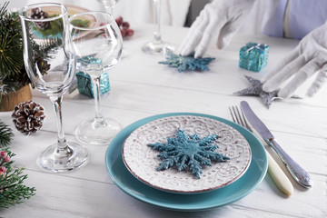 Beautiful Christmas table setting with decorations