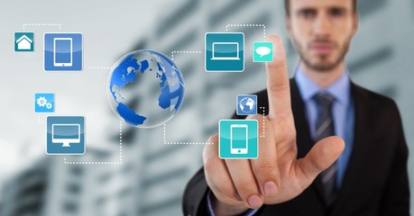 World app devices and Businessman touching air in front of