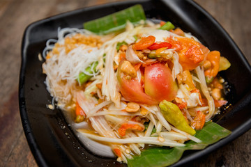 Fototapeta na wymiar papaya salad or Som Tum, Thai food