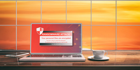 Ransomware attack on a laptop screen. Blurred sunset background. 3d illustration