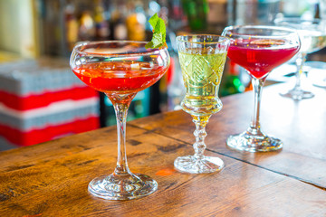 Colorful cocktails on the bar table in restaurant.