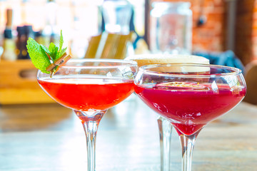 Colorful cocktails on the bar table in restaurant.