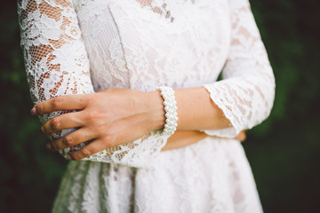 The bride's hands. Beautiful bracelet