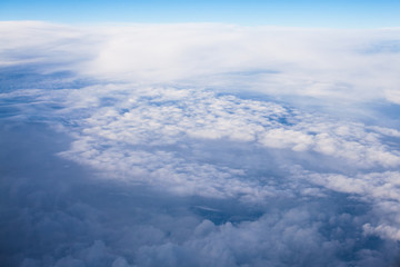 Beautiful, dramatic clouds and sky viewed from the plane
