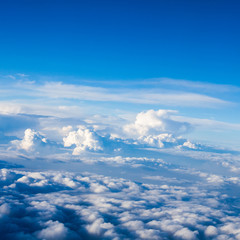 Beautiful, dramatic clouds and sky viewed from the plane

