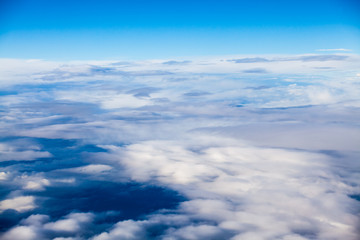 Beautiful, dramatic clouds and sky viewed from the plane

