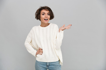 Portrait of a young casual girl in sweater