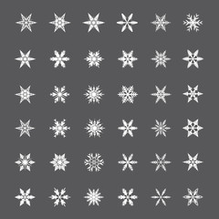 Collection of White Snowflakes on gray background. Vector Illustration