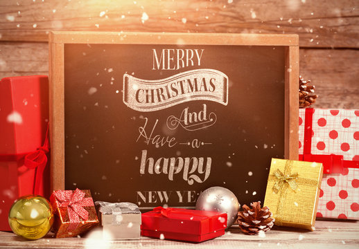 Chalkboard Surrounded by Christmas Gifts Mockup 2
