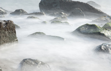 Rocks over the water ( Seaside of Badalona - Spain )