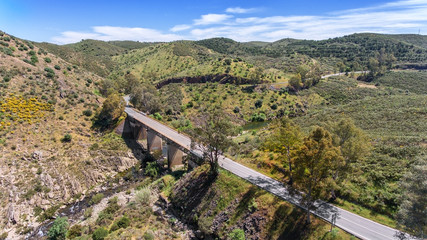 Naklejka premium Aerial. Terrain of Alentejo, shooting from the drone.. Road to the village of Mertola.