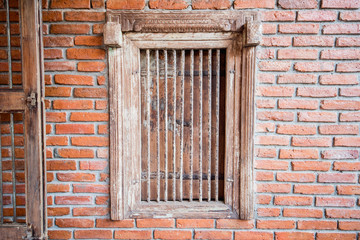 Fototapeta na wymiar windows on brick wall