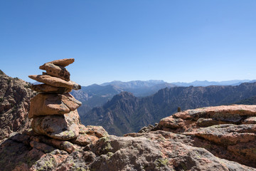 view of red stone pyramid, mountains of Corsica