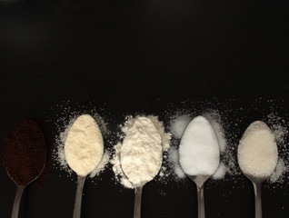 five teaspoons with ingredients