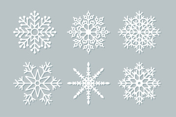 Fototapeta na wymiar Set of six geometric Christmas snowflakes and stars. Vector illustration.