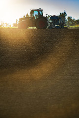 tractor in sunset