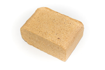 Briquettes from hardwood sawdust on a white background. Alternative fuels. ECO-friendly fuel. Biofuel for stoves.