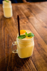 ice coffee and juice on wooden background