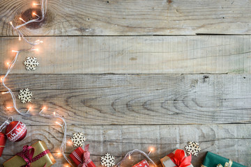Christmas presents on wooden table top background - Powered by Adobe