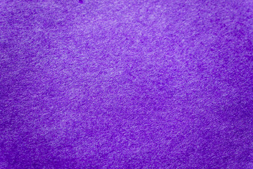 A grainy background of a violet color