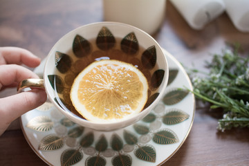 Vintage cup of tea with lemon