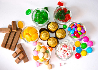 Candies Choclates, Background Image Sweets, Candies Jelly Sugar Colorful Array Different Child sweets and treats, An assortment of colourful candy, Milk Chocolate Jelly Gums Candies Top View