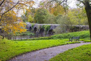 The ancient stone built  Shaw's Bridge over the River Lagan close to the little mill village of Edenderry on the outskirts of South Belfast in Northern Ireland