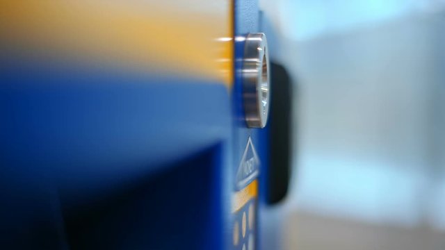 Nice CloseUp of Paying by Coins using Coin Acceptor on a Automatic Vending Machine