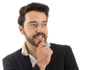 Smiling man looks to the side. bearded person wears black jacket and white shirt. Isolated..
