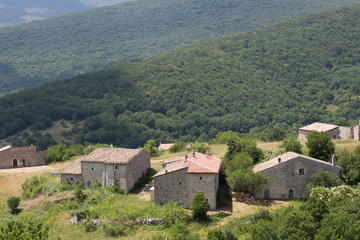 Fototapeta na wymiar Ancient restored houses in an abandoned mountain village, Central Italy
