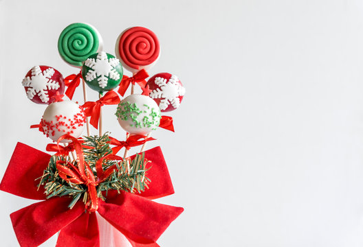 Christmas cake pops served on white background,blank space