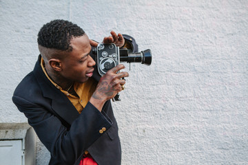 Portrait of an elegant young man with tattoos.