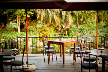 Outdoor patio table chair sunset