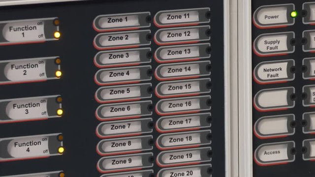 Close up of multi zone fire alarm panel with touch screen control on the right