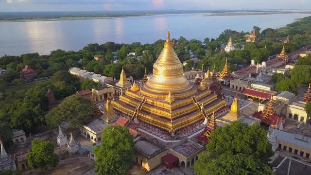 4K Aerial: view at the ancient Shwezigon Pagoda,the main tourist destination of Bagan, Myanmar (Burma)