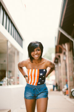 Black girl in Americana top walking