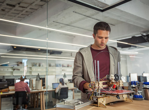 Designer Working at a 3D Printer