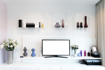 TV and shelf in living room Contemporary style. Wood furniture in white with decorative at home.