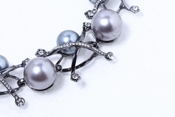 Fototapeta na wymiar Black Pearl with diamond stick Necklace on white background, copy space for text