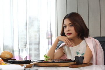 Beautiful Hi-So Woman in Luxury Restaurant having Expensive Food Stylish Lunch, Lobster Pasta, Tasmania Salmon, sit in leather chair gold room, feeling fun enjoy lovely