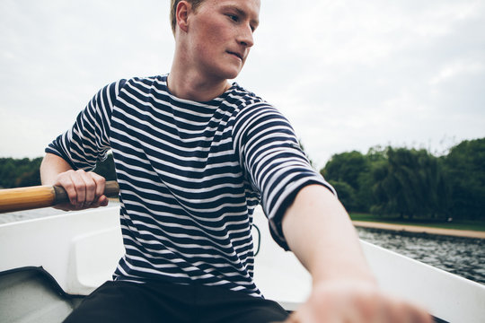 Young man rowing