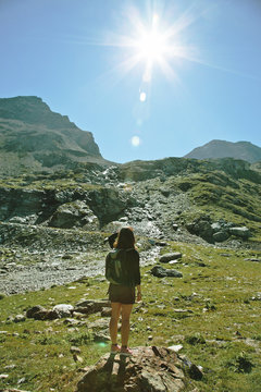 Hiker woman contempling a beautiful landscape. Alps, france.
