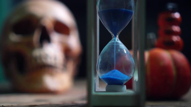 Halloween day footage with skull, pumpkin, candle light, and movement