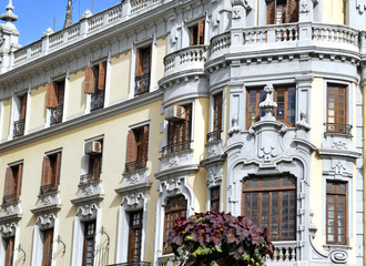 Facades of Colorful buildings typically found in Madrid Spain