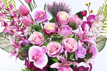 Bouquet of Purple many kind of flower on roman column jar Artificial , studio lighting white background